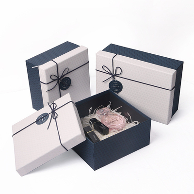 Parfumez le couvercle de boîte d'emballage de cadeau de cosmétiques et la boîte basse avec le raphia de Bowknot de ruban