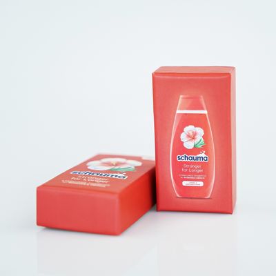 Emballage en relief de boîtes en papier colorées pour les cosmétiques et les shampooings capillaires